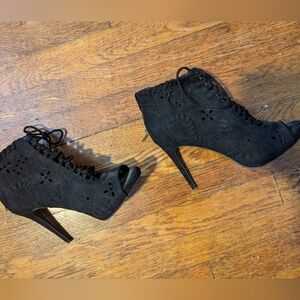 Black lace up high heels boots